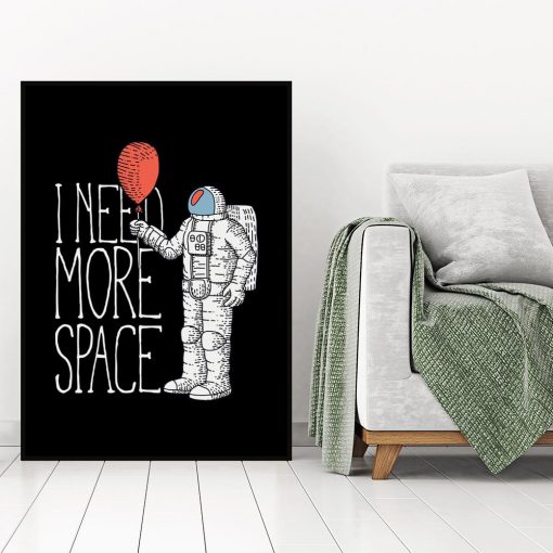 plakat z kosmonautą